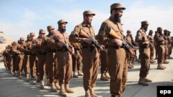 Afghan local police following completion of training in Baghlan Province in 2011