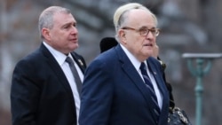 Parnas (left) with U.S. President Donald Trump's attorney Rudy Giuliani at the funeral for George H.W. Bush in 2018. The Soviet-born Parnas worked as a fixer for Giuliani in Ukraine.