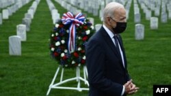 U.S. President Joe Biden looks on after laying a wreath at Arlington National Cemetery in Virginia to honor fallen veterans of the Afghan conflict on April 14. He announced the withdrawal of all U.S. troops from Afghanistan on the same day.