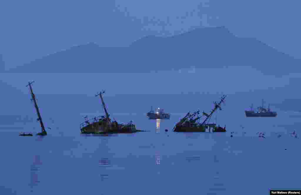 Dusk in the harbor on Kunashir Island. Fishing is the main source of income for the Russians here, but infrastructure is ragged and economic prospects for locals are generally bleak. A Japanese man who was evicted in 1947 described his former homeland as "a wasteland" when he visited in 2005.