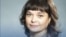 Natalya Mikhailova is known locally for exposing embezzlement of government funds for transportation as a journalist and chief editor of a local outlet.