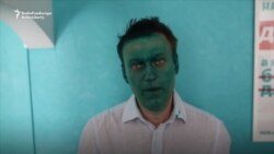 Russian Anti-Kremlin Activist Doused With Green Liquid Russian Anti-Kremlin Activist Doused With Green Liquid