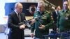 Президент РФ Владимир Путин и министр обороны РФ Сергей Шойгу
