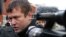 Russia -- Opposition activist Leonid Razvozzhayev gives an interview to journalists outside the Investigative Committee in Moscow, 23Oct2012