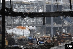 Територія Міжнародного аеропорту «Донецьк» імені Сергія Прокоф’єва після обстрілів російськими гібридними силами, 16 жовтня 2014 року