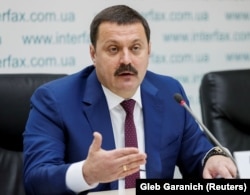 Ukrainian lawmaker Andriy Derkach speaks at a news conference in Kyiv in October 2019.