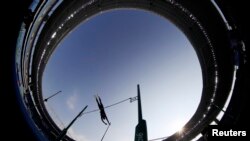 Акс аз мусобиқаи ҷаҳидан бо симхода дар Бразилия. Соли 2016