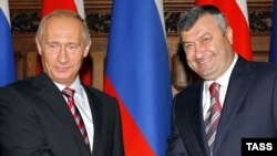 Has Putin (left) lost patience with South Ossetia's Eduard Kokoity?