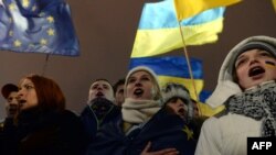 Ukrainian students sing the national anthem during a mass rally on Independence Square in Kyiv in favor of the EU agreement last month.