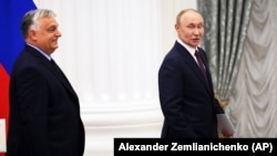 Премьер-министр Венгрии Виктор Орбан (слева) и президен России Владимир Путин. Москва, 5 июля 2024 года