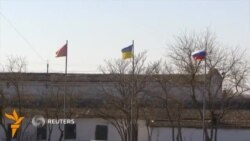Тасарруфи пойгоҳи баҳрии Украина дар Феодосияи Қрим аз сӯи нирӯҳои Русия Тасарруфи пойгоҳи баҳрии Украина дар Феодосияи Қрим аз сӯи нирӯҳои Русия