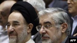 Iranian opposition leader, Mir Hossein Musavi (right) with former reformist President Mohammad Khatami