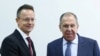 Ministrul de externe al Rusiei, Serghei Lavrov (dreapta), și ministrul de externe al Ungariei, Péter Szijjártó, la Conferința privind securitatea eurasiatică, desfășurată la Minsk, Belarus, 31 octombrie 2024.