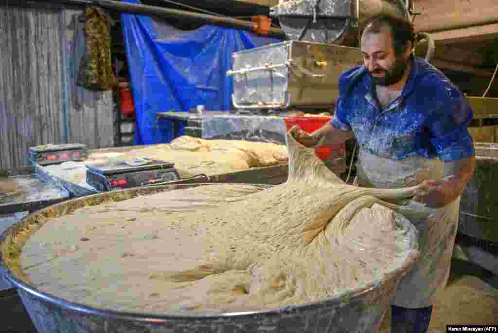 A baker prepares dough in Stepanakert on November 5. 