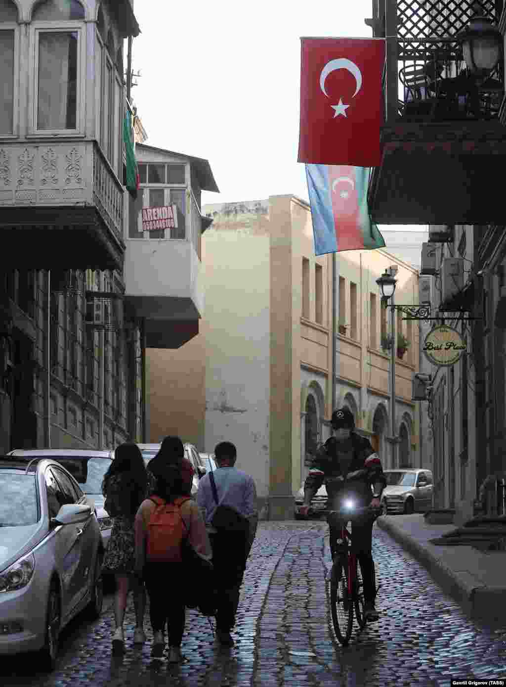 Turkish and Azerbaijani flags hang over the street in central Baku on October 23. Turkey and Azerbaijan share strong cultural and historical ties. 