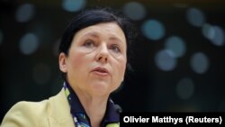 Vera Jourova, the European Commission's vice president and commissioner for values and transparency, addresses a plenary session at the European Parliament in Brussels on November 24.