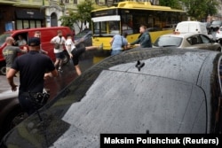 Під час бійки між нападниками на автомобіль п'ятого президента України Петра Порошенка і його охоронцями. Київ, 25 липня 2019 року