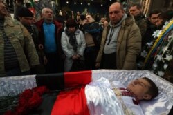 Похорон одного з убитих протестувальників