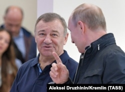 Аркадій Ротенберг та Володимир Путін