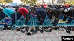 Muslims pray at a mosque in Almaty. The bill also gives police more rein to monitor people suspected of religious extremism, issue warnings, and to compile a list of such suspects.