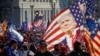 Supporters of U.S. President Donald Trump participate in a "Stop the Steal" protest after the election was called for Democratic candidate Joe Biden in Washington on November 14, 2020.