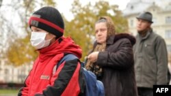 A boy wears a mask in the western Ukrainian city of Lviv