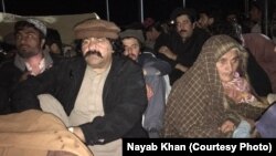 Ali Wazir (left) attends a funeral for a PTM activist in Qilla Saifullah, southwestern Pakistan, in February 2019.