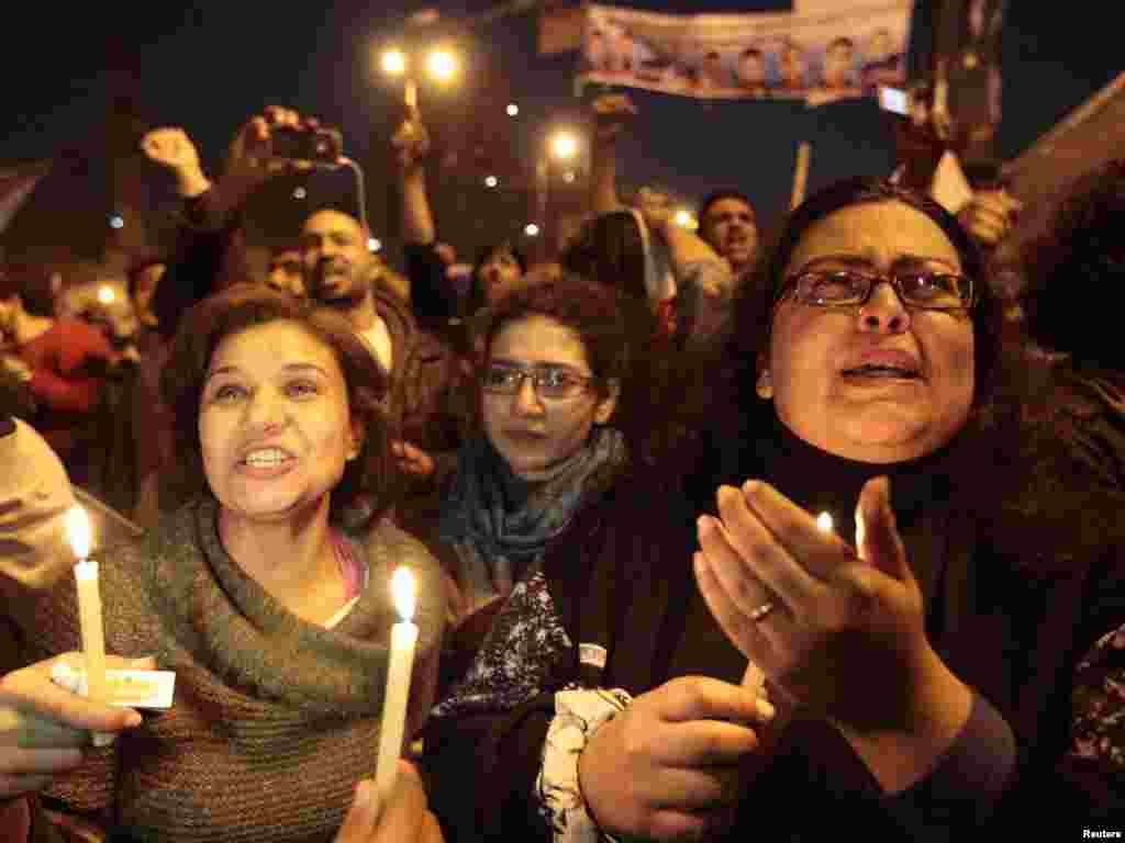 Protesters celebrate in Tahrir Square after the announcement of Mubarak's resignation on February 11, 2011.