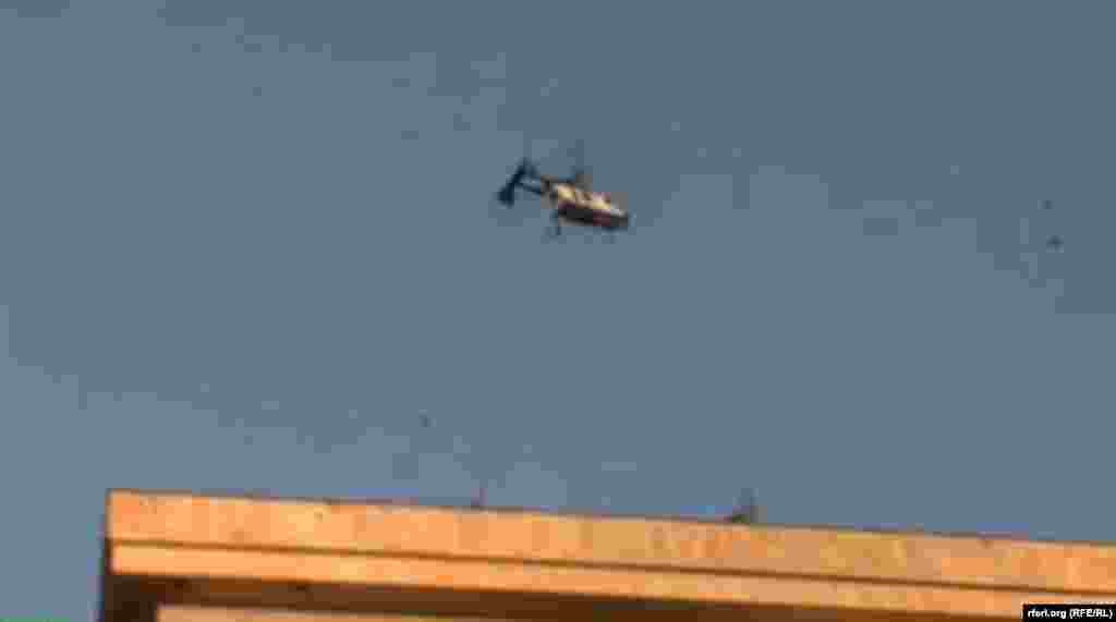 A police helicopter loomed over the crowd all afternoon and police were also seen photographing demonstrators. 