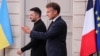 Ukrainian President Volodymyr Zelenskyy and French President Emmanuel Macron arrive at a press conference in Paris on September 4.