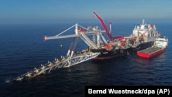 A ship works in the Baltic Sea on the natural gas pipeline Nord Stream 2 from Russia to Germany.