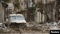Damaged buildings following fighting in the old Syrian city of Homs late last month. The UN estimates that more than 9,000 people have died since violence erupted in the country more than a year ago.