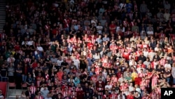 Fans watch Southampton take on Leeds United during an English Premier League soccer match at St. Mary's Stadium in Southampton in October.