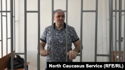 Оюб Титиев