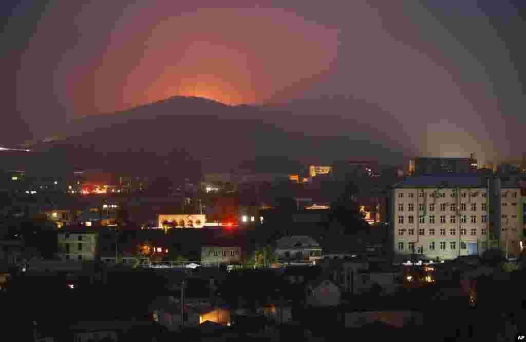 Fires burn in the forest around Stepanakert amid fighting on November 5. 