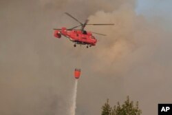 Helikopter Ministarstva unutrašnjih poslova Srbije učestvuje u gašenju požara u blizini Podgorice