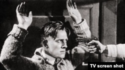 Russia -- A screen-grab of a film with a spy arrested, undated