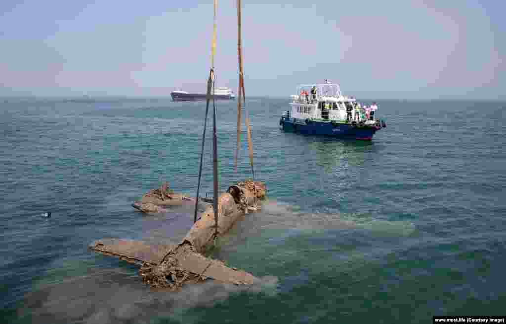 In May 2017, divers tasked with scouring the seabed for explosives that could endanger the bridge discovered a Curtiss P-40 Warhawk downed during World War II. In 1945, a bridge connecting Crimea and the Russian mainland was completed but collapsed after an ice floe crunched into the hastily made structure. 