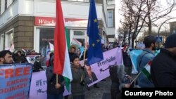 Tajik opposition activists rally in Berlin on December 10.