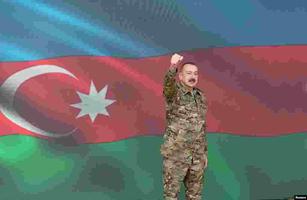 Azerbaijani President Ilham Aliyev gestures as he makes a televised address on November 8 announcing the capture of Shushi/Susa. 