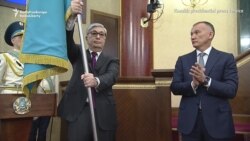 Kazakhstan Gets New President As Nazarbaev Looks On Kazakhstan Gets New President As Nazarbaev Looks On