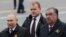 Владимир Путин и Эмомали Рахмон на Красной площади после парада, 9 мая 2021 года