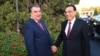Tajik President Emomali Rahmon (left) greets Chinese Prime Minister Li Keqiang in Dushanbe late last year.