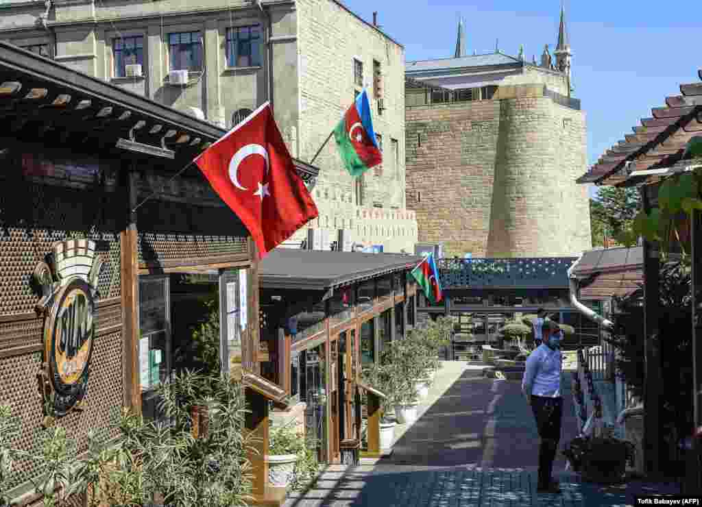 A restaurant displays Azerbaijani and Turkish flags in Baku's old town on October 14. 