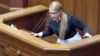 Yulia Tymoshenko calls for the impeachment of Ukrainian President Petro Poroshenko at a parliament session in Kyiv on February 26.