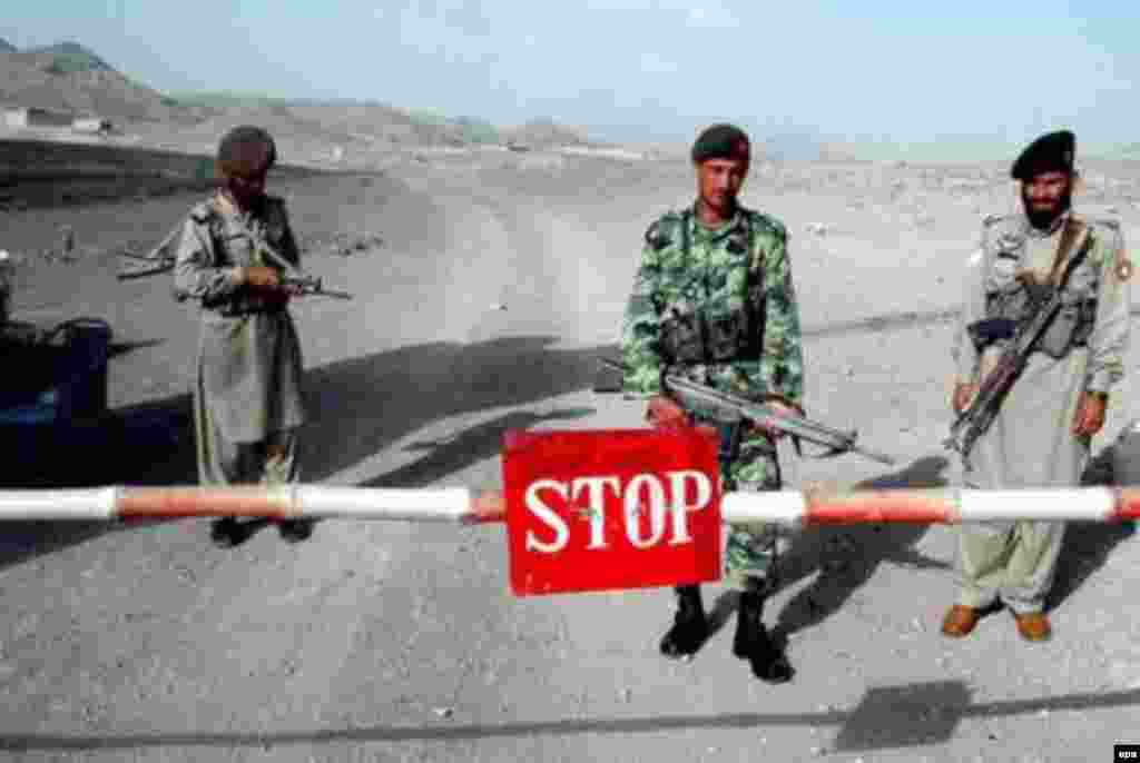 Pakistani paramilitary troops guard a border checkpost in North Waziristan, in western Pakistan's volatile Federally Administered Tribal Areas (FATA) - A long-standing border dispute between Islamabad and Kabul has bolstered the view from Pakistan that it must seek to contain Afghanistan and keep in check Afghan nationalists who might otherwise assert claims to Pakistani territory.