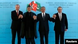 Hamid Karzai (second from left) made his comments while attending a summit with Turkish Prime Minister Recep Tayyip Erdogan (left), Turkish President Abdullah Gul (second from right) and Pakistani Prime Minister Nawaz Sharif (right).