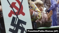 Архивное фото. Акция «Балтийский путь», больше двух миллионов человек выстроились в живую цепь между Таллином, Ригой и Вильнюсом, чтобы показать всему миру свое желание получить независимость от Советского Союза. Таллин, 23 августа 1989 года.