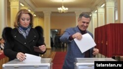 Tatarstan's Moscow-appointed President Rustam Minnikhanov (right) has three years left on his current term, but an election will be held to choose his successor.