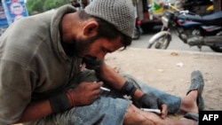 د نشه یې توکیو او جرمونو پرضد د ملګرو ملتونو ادارې "یو این او ډي سي" مطابق په پاکستان کې دا مهال څه باندې ۶۷ لاکه کسان په نشو اخته شوي دي. (انځور: ارشیف)